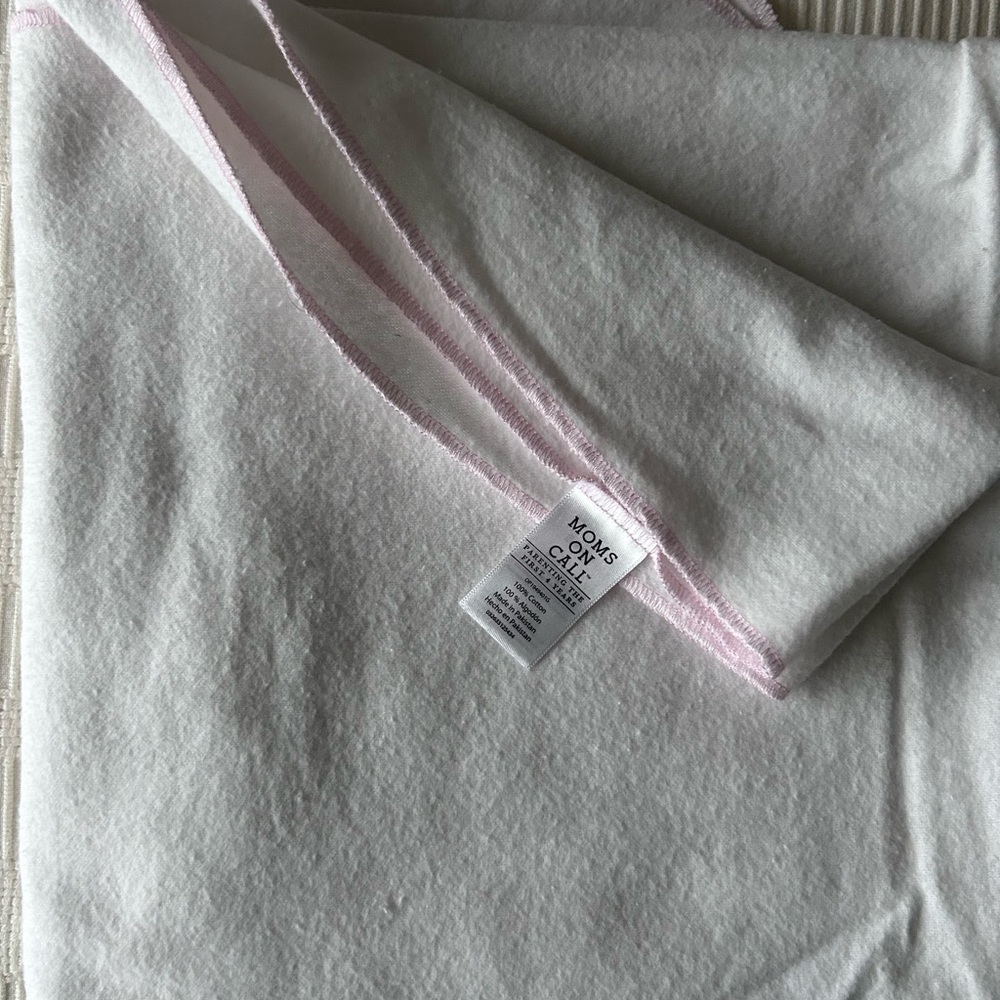 *Mom's On Call* White Swaddle Blanket with Pink Trim